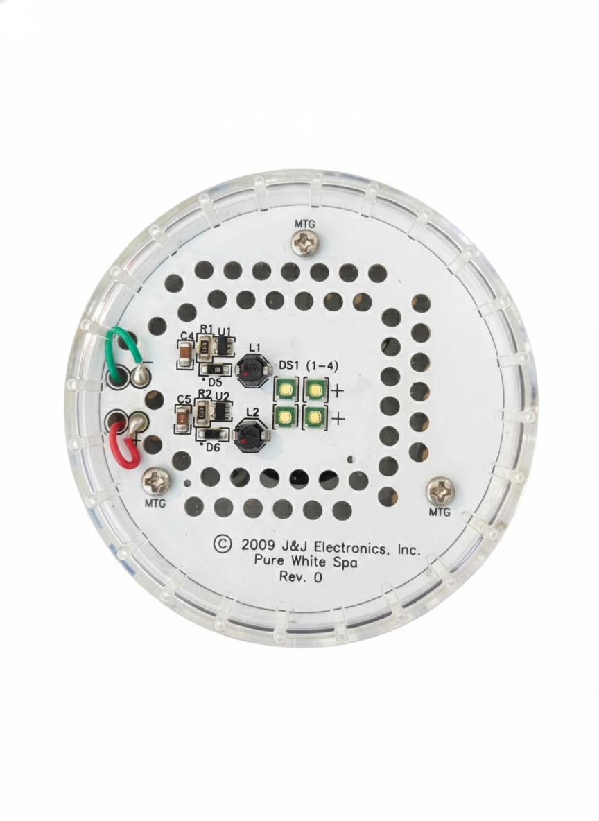 Dispositivo de iluminación LED para spa con circuitos y conectores visibles en la parte posterior.